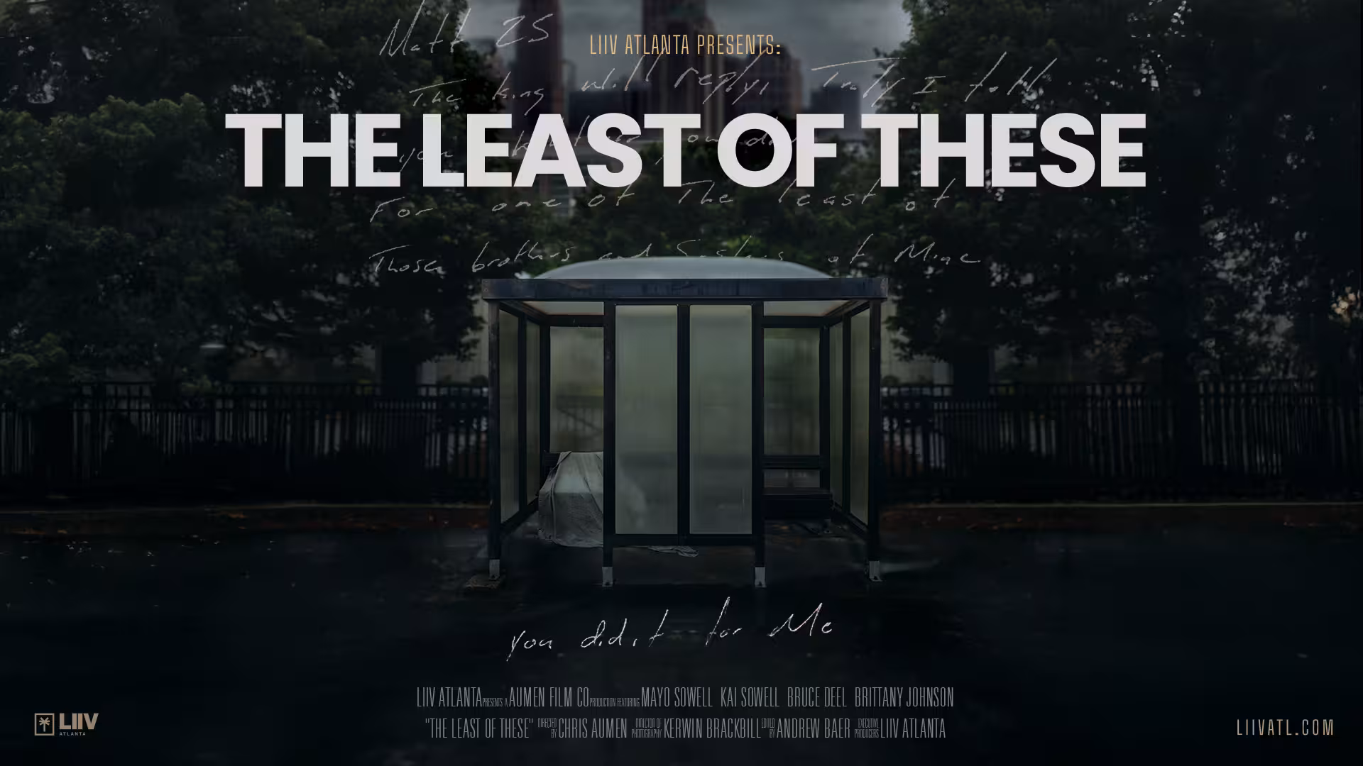 Key art for The Least of These: a rainy city bus stop at dusk with a figure wrapped in white inside; handwritten Matthew 25 verse floats across the sky above the title.